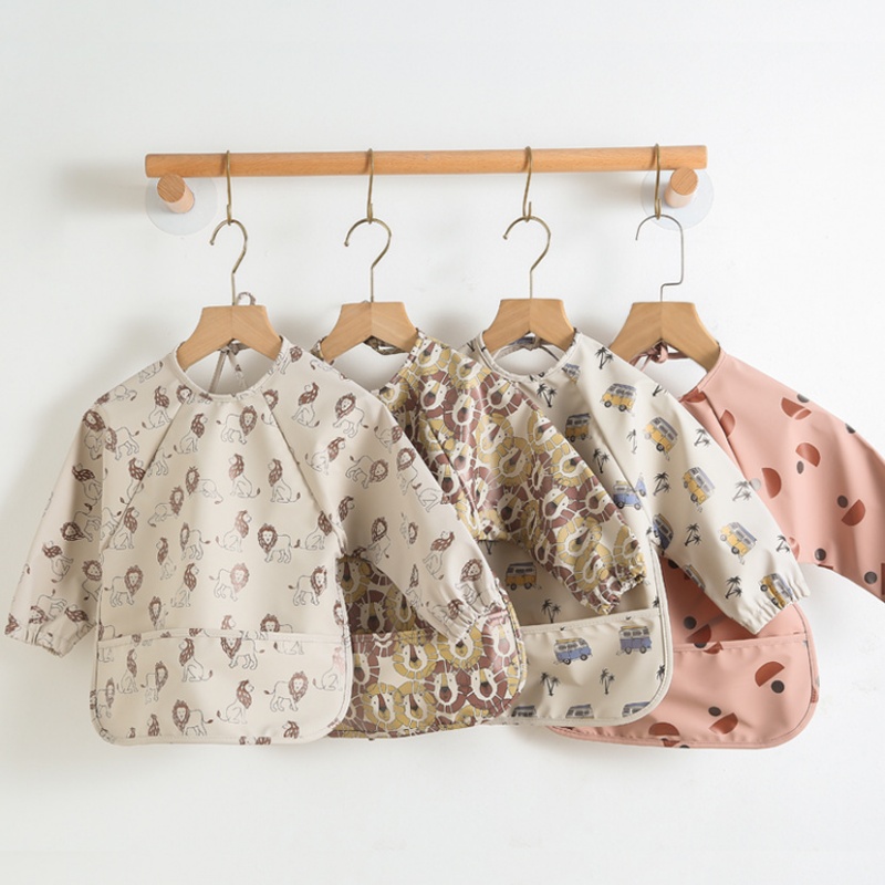PU-omkeerbaar slabbetje met la - Bib Long Sleeve recensie en prijs