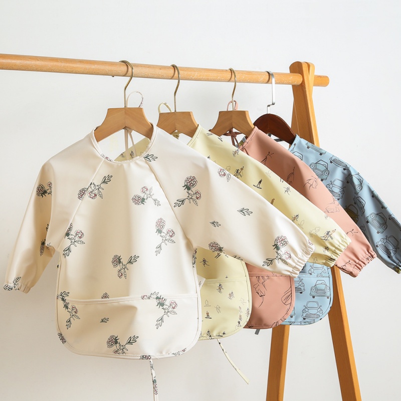 PU-omkeerbaar slabbetje met la - Bib Long Sleeve recensie en prijs
